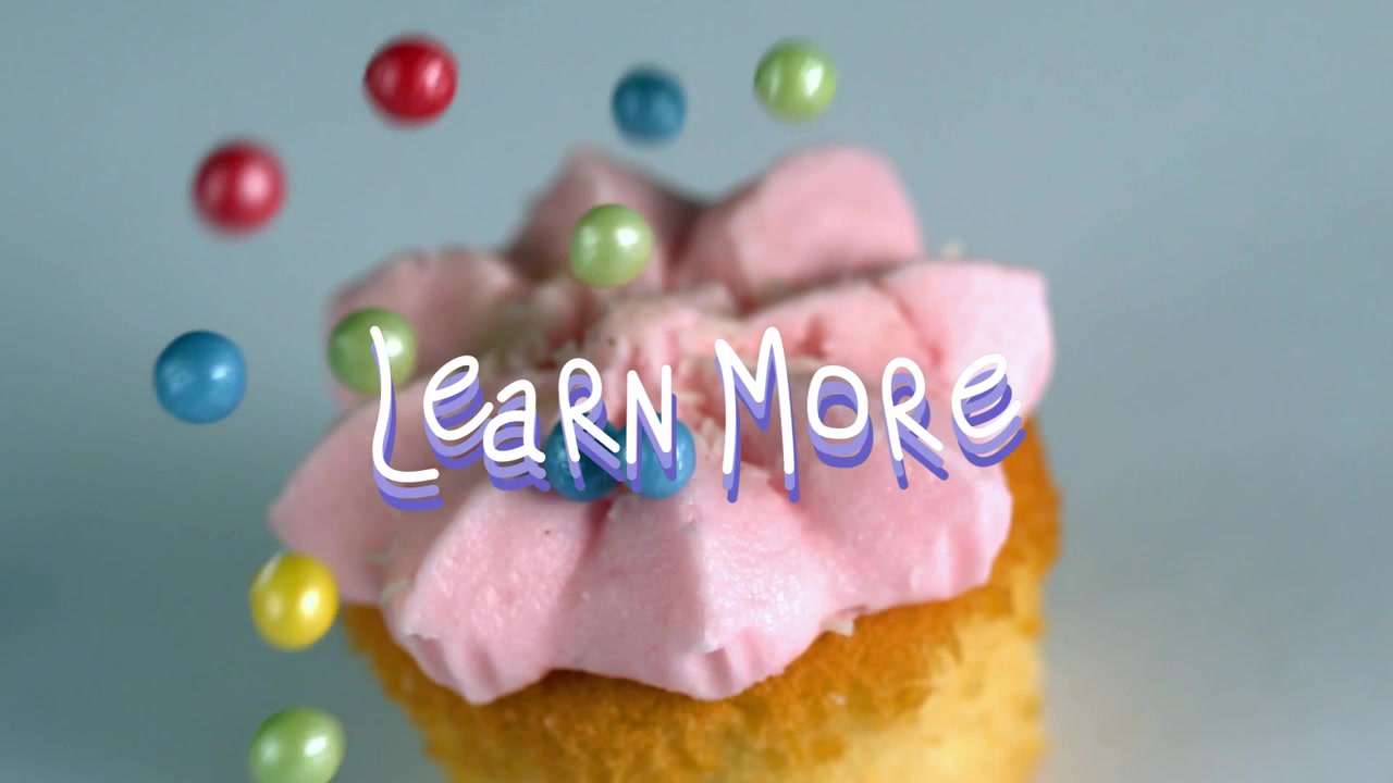 Pink cupcake centered while pearls entering edges, piling on frosting, highlighting Learn More