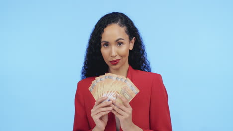 portrait of black woman with money fan