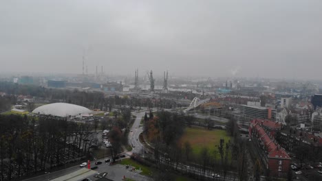 Aerial-view-on-port-and-city-of-Gdansk,-Poland-on-cloudy-autumn-day