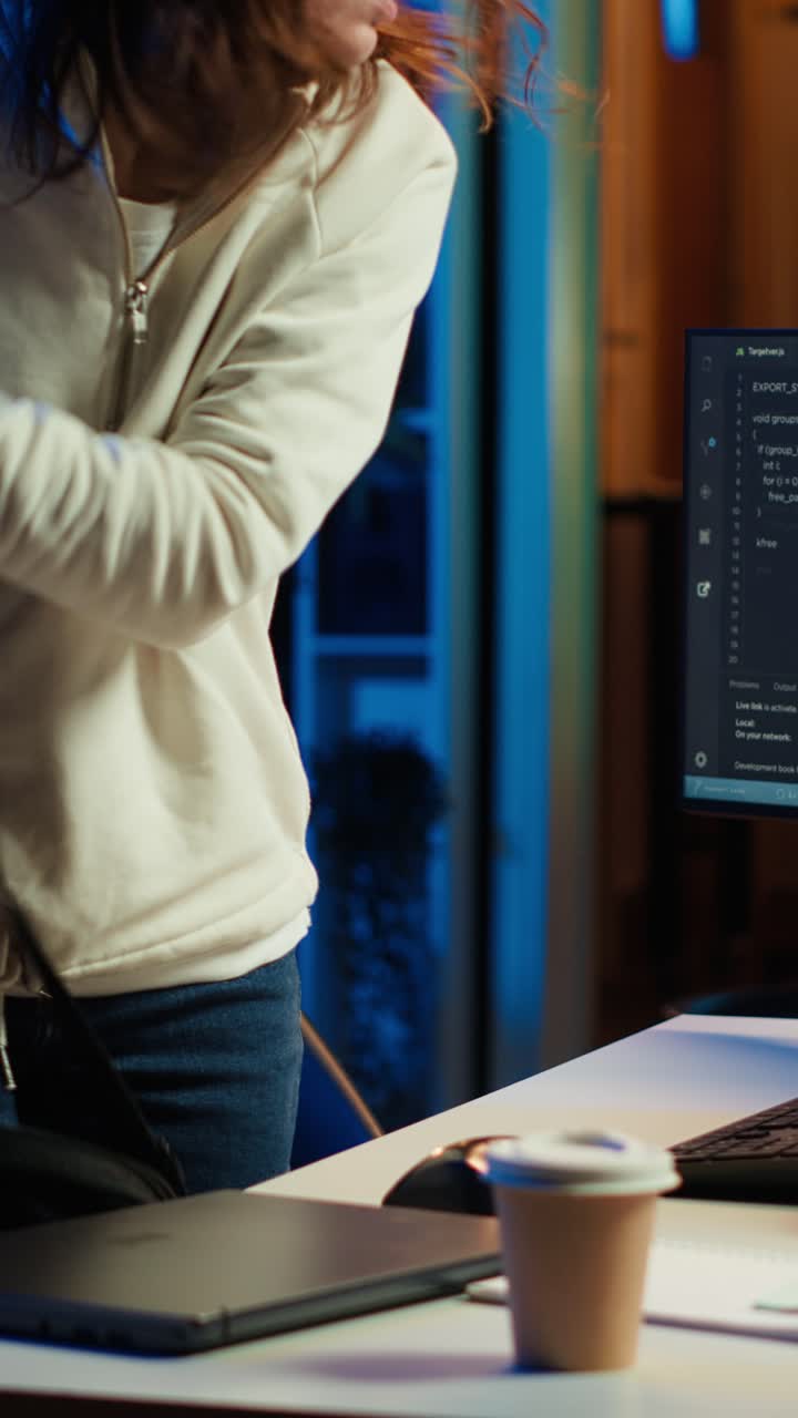 Vertical video IT expert starting job shift, ready to design and develop software applications