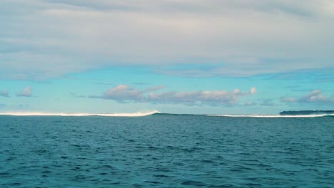 HD-120fps-Hawaii-Kauai-Boating-on-the-ocean-floating-left-to-right-with-waves-in-distance