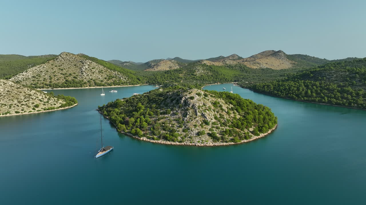 Luxury sailing yacht moored in front of Tela&scaron;ćica national park in Croatia on a sunny day