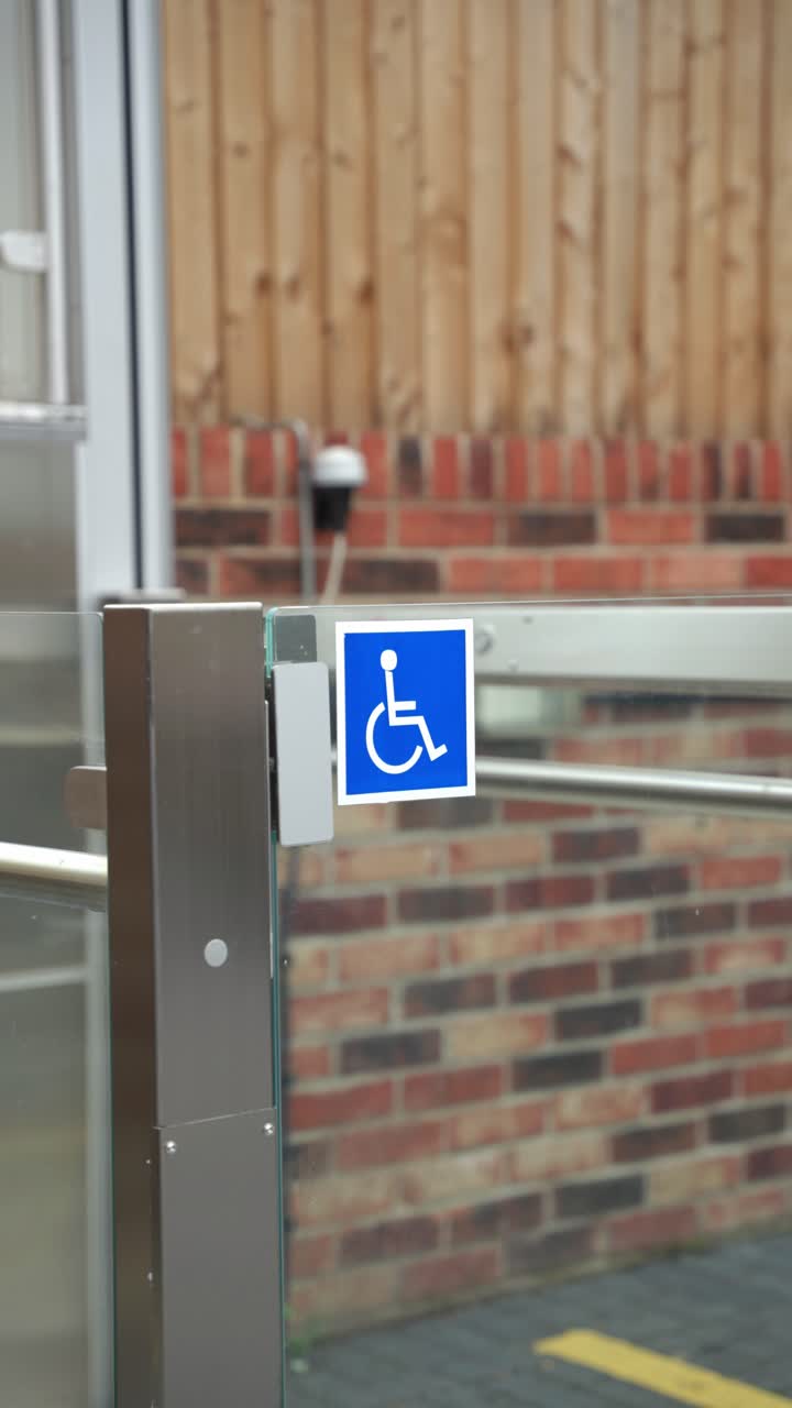 Accessibility lift in building with wheelchair sign, interior view
