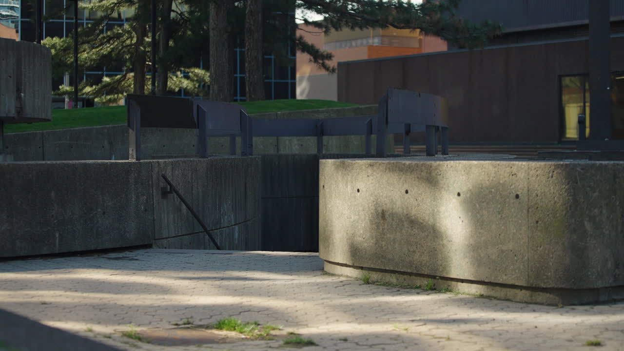 Concrete Urban Plaza With Curved Barriers And Railings In Hamilton, Canada. static shot