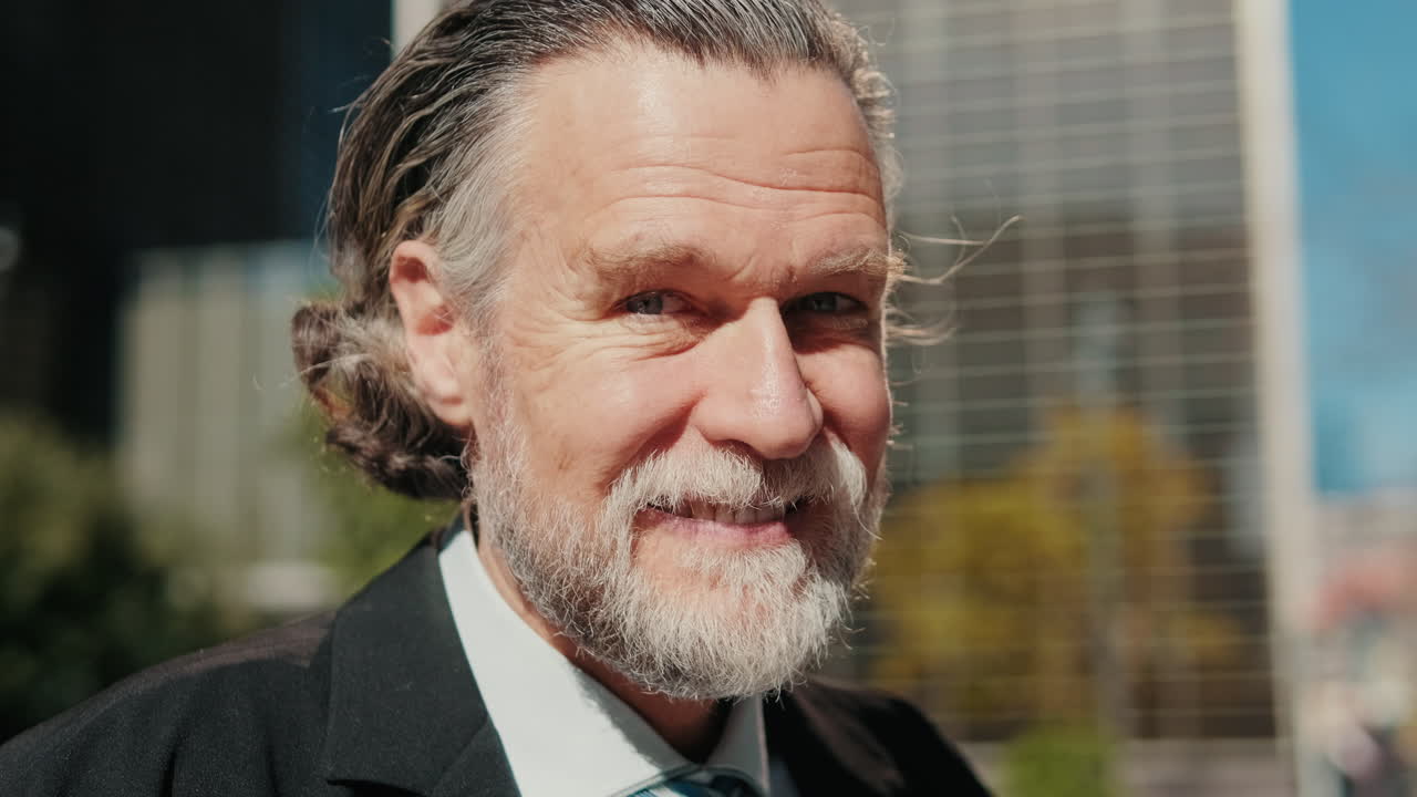 Confident Senior Businessman Enjoys Coffee Break