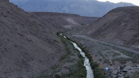 view from the drone on the valley and a river runs through the valley bishop, ca