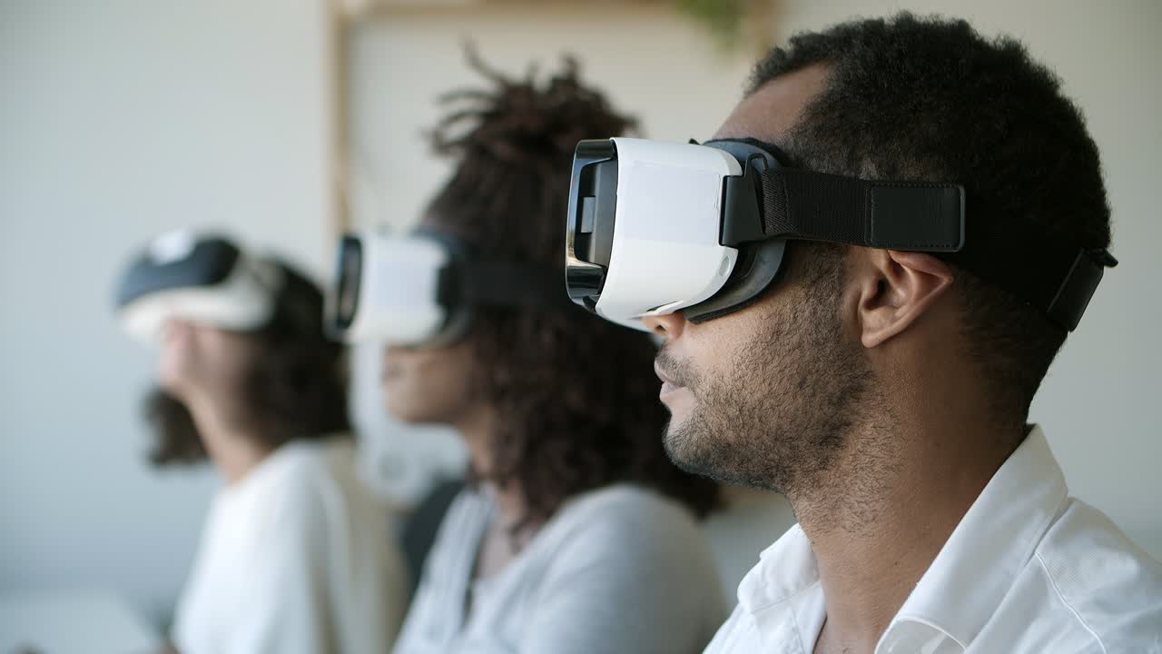 Closeup shot of young man experiencing virtual reality headset.