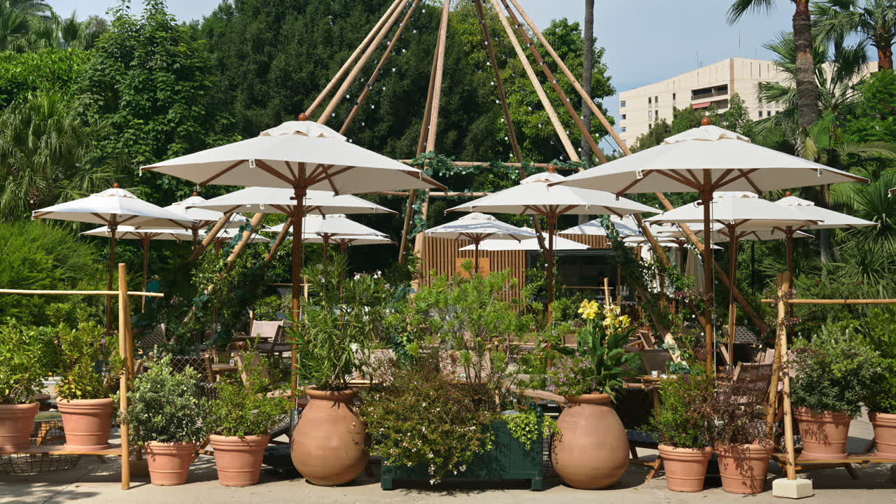 White umbrellas at a terrace in Monte Carlo, Monaco