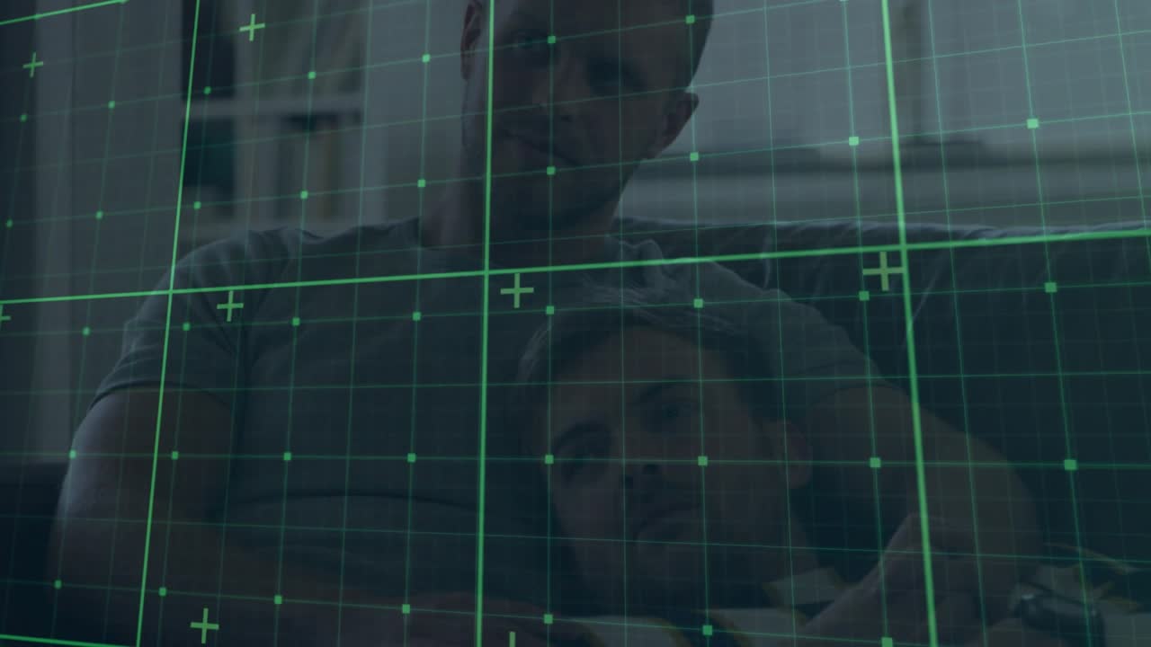 Device activating grid overlay around couple rotating and scanning them for tech demo