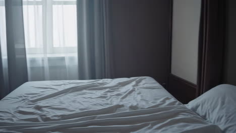 empty bed in a hotel room