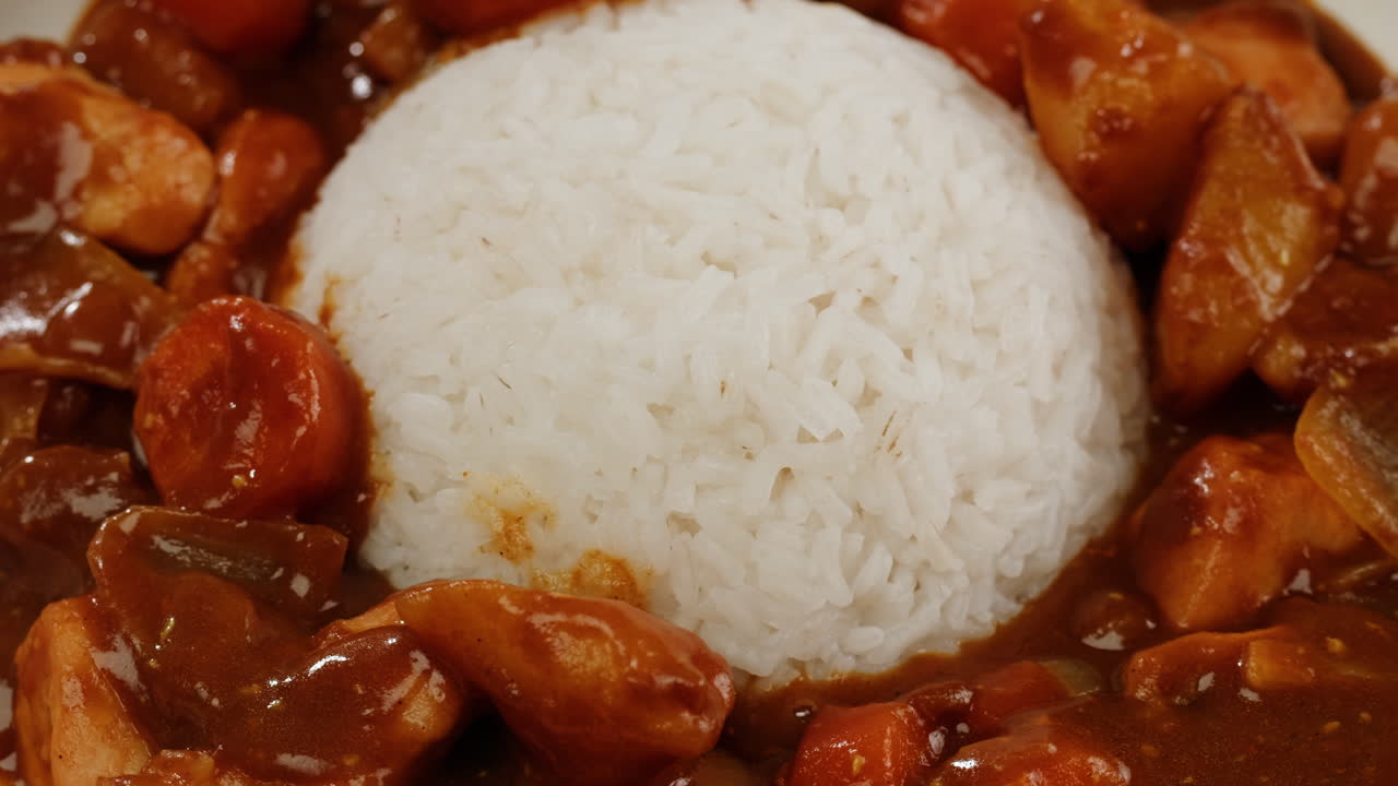 Japanese curry rice with fry pork Tonkatsu, Katsu Kare, Japanese breaded cooking dinner in restaurant, close up macro of asian food