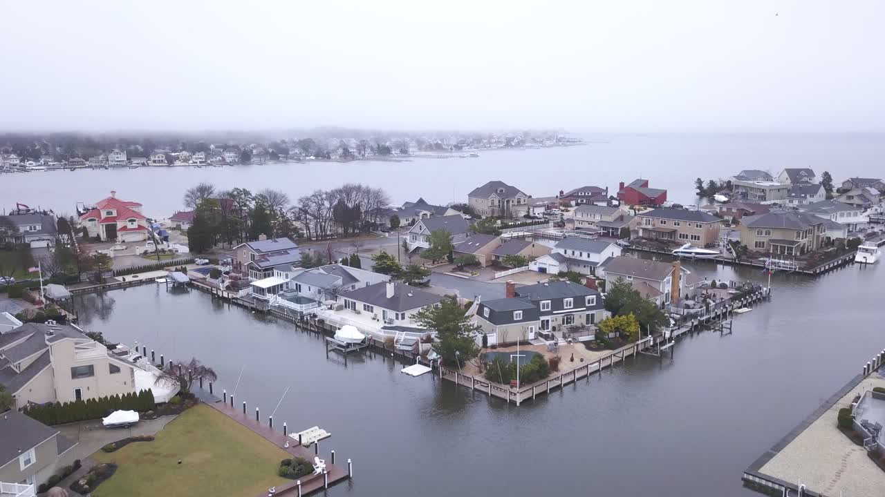 Majestic luxury town of Toms River on riverbanks in aerial view