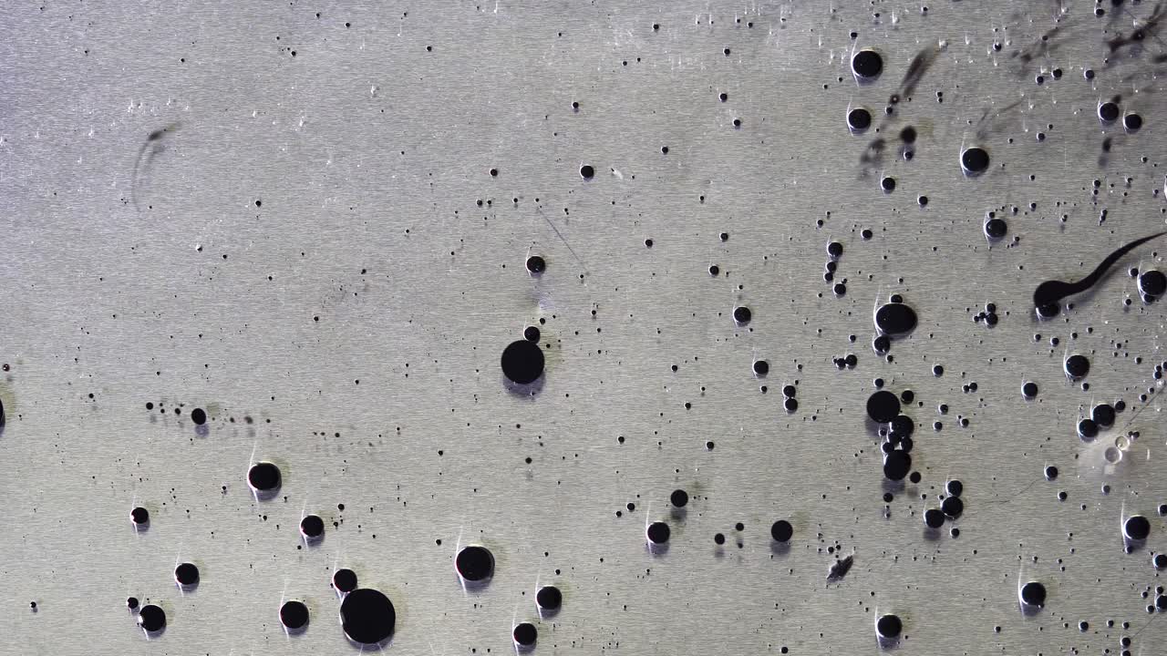 Ink Stains on Metal Surface