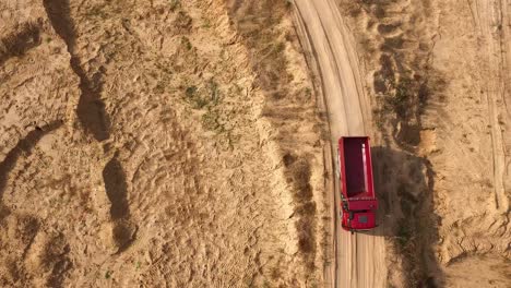 aerial view of a dump truck in a sand quarry