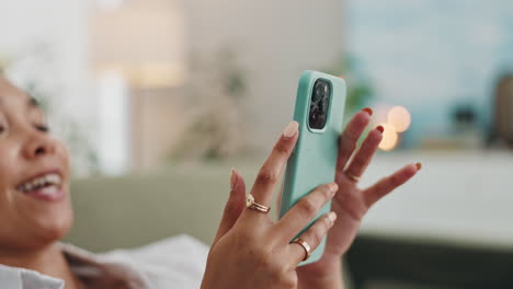 woman using a light teal case smartphone