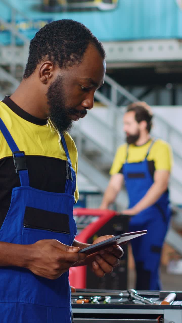Vertical video Engineer in car service orders parts