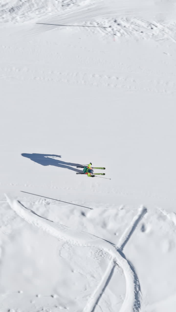 Aerial drone view of a ski resort in Col dei Baldi, Alleghe, in the Dolomites, Italy in daylight. Vertical