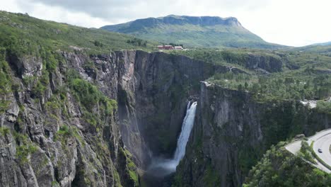 Voringfossen-Waterfall-in-Norway---Scenic-Nature-Landscape-in-Eidfjord,-Vestland---Aerial-Tilting-Down
