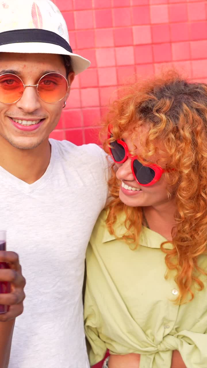 Group of friends enjoying a summer day with drinks