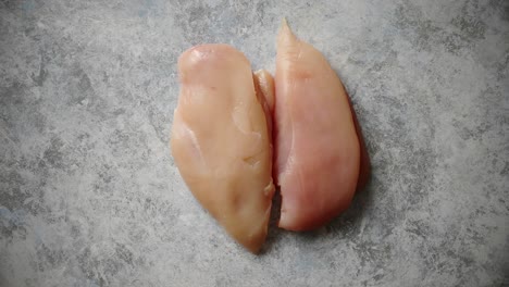 top view of two fresh raw chicken fillets