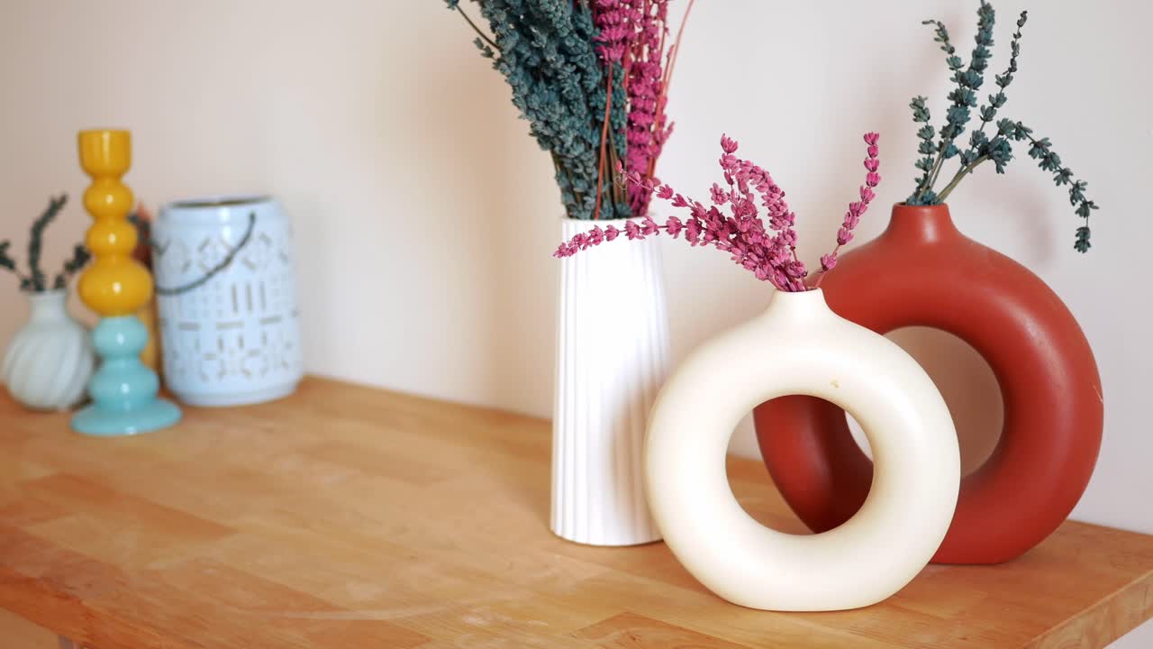 Still life with vases and dried flowers