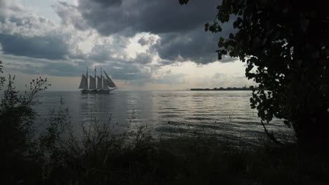 wide shot of a tallship sailing on the great lakes