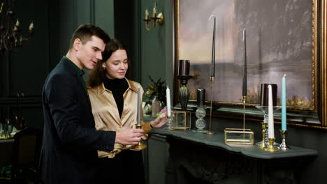 couple looking at classic ornaments