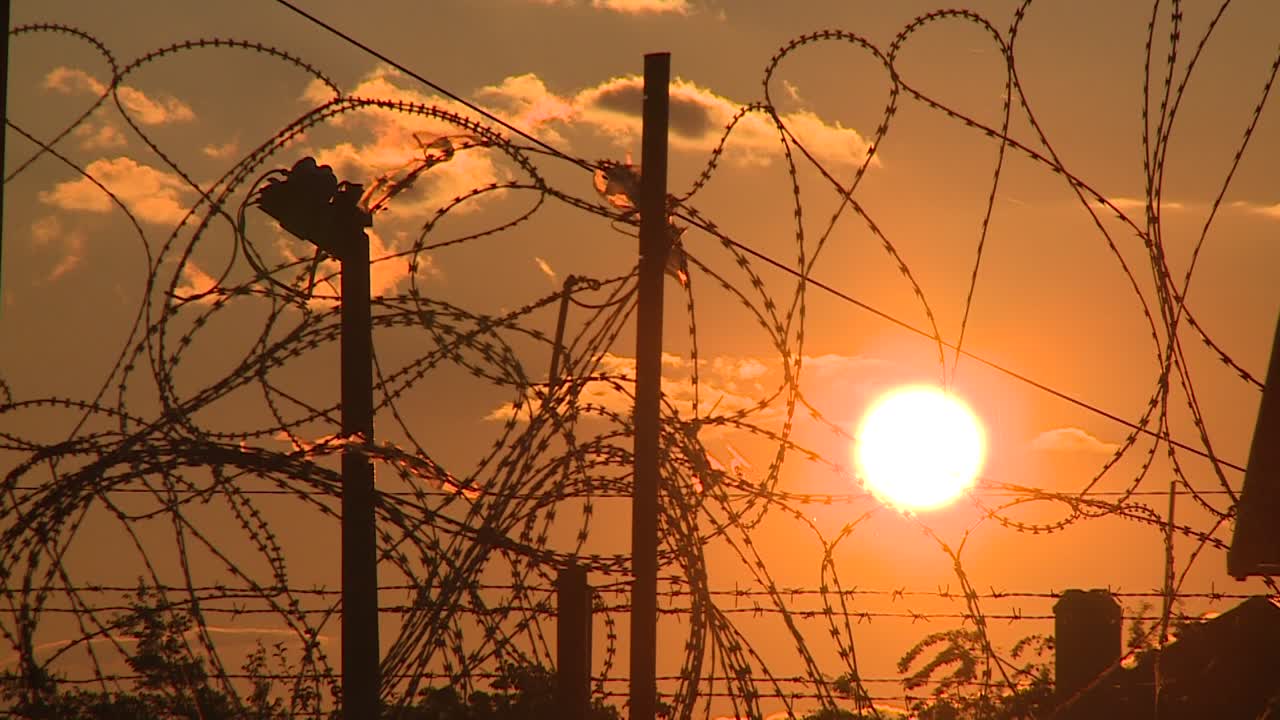 Military base surrounded by wire