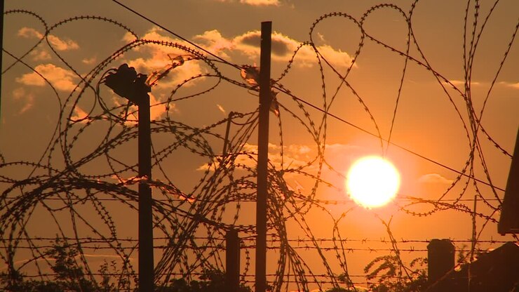 Military base surrounded by wire