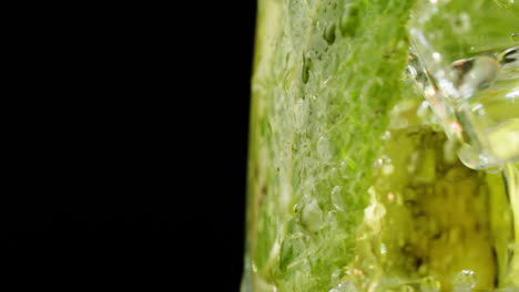 close-up of a refreshing iced cocktail with mint