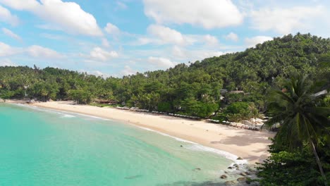 Wonderful-drone-flight-over-the-empty-Pansea-Beach-in-Phuket,-Thailand