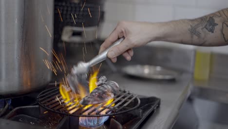 chef preparing food with charcoal grill
