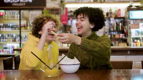 lesbian couple in a bar