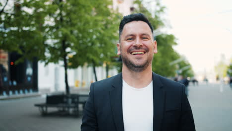 smiling business man on city street