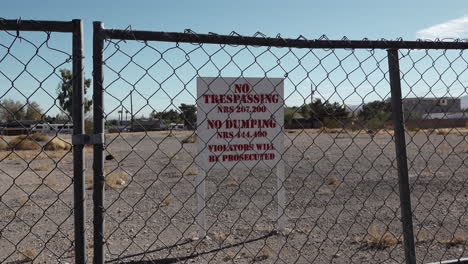 Empty-lot-with-no-trespassing-sign