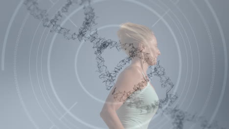 animation of 3d dna strand spinning over scope scanning and woman running