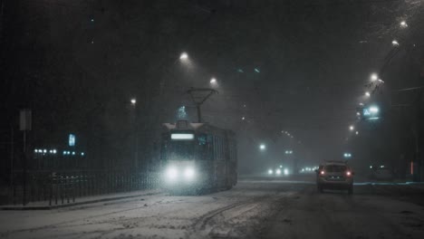 Tram-parked-in-the-station,-on-a-frosty-winter-night,-blizzard,-snow-storm