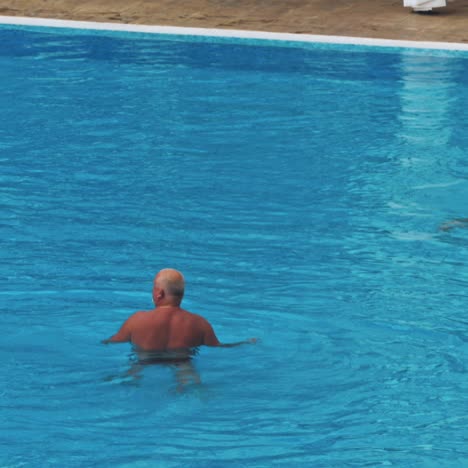 happy family having fun in the swimming pool.