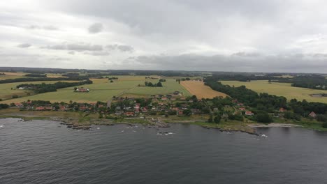 drone view of small village at the danish island bornholm in the summer