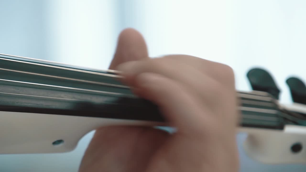 Violinist playing the violin close-up slow motion