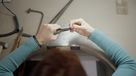 jeweler repairing a ring