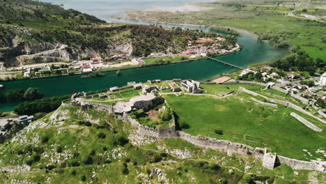 gorgeous panoramic aerial view of a castle in ruins on a hill