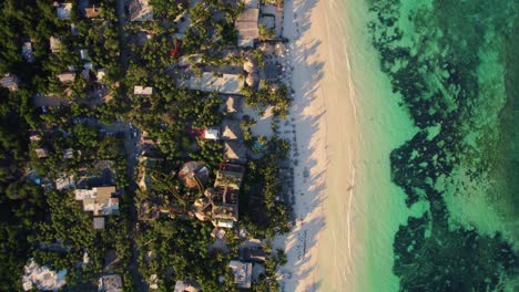 aerial birds eye view of sandy akiin beach with turquoise seas