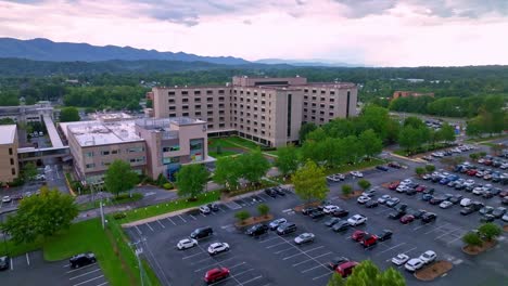johnson city medical center aerial reveal over the trees in johnson city tennessee
