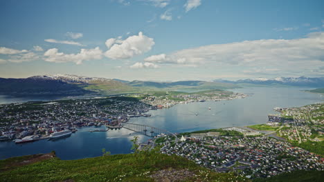 panoramic view of tromso, norway from a high viewpoint.
high view of the nordic city, the landscape and the beautiful norwegian fjords.