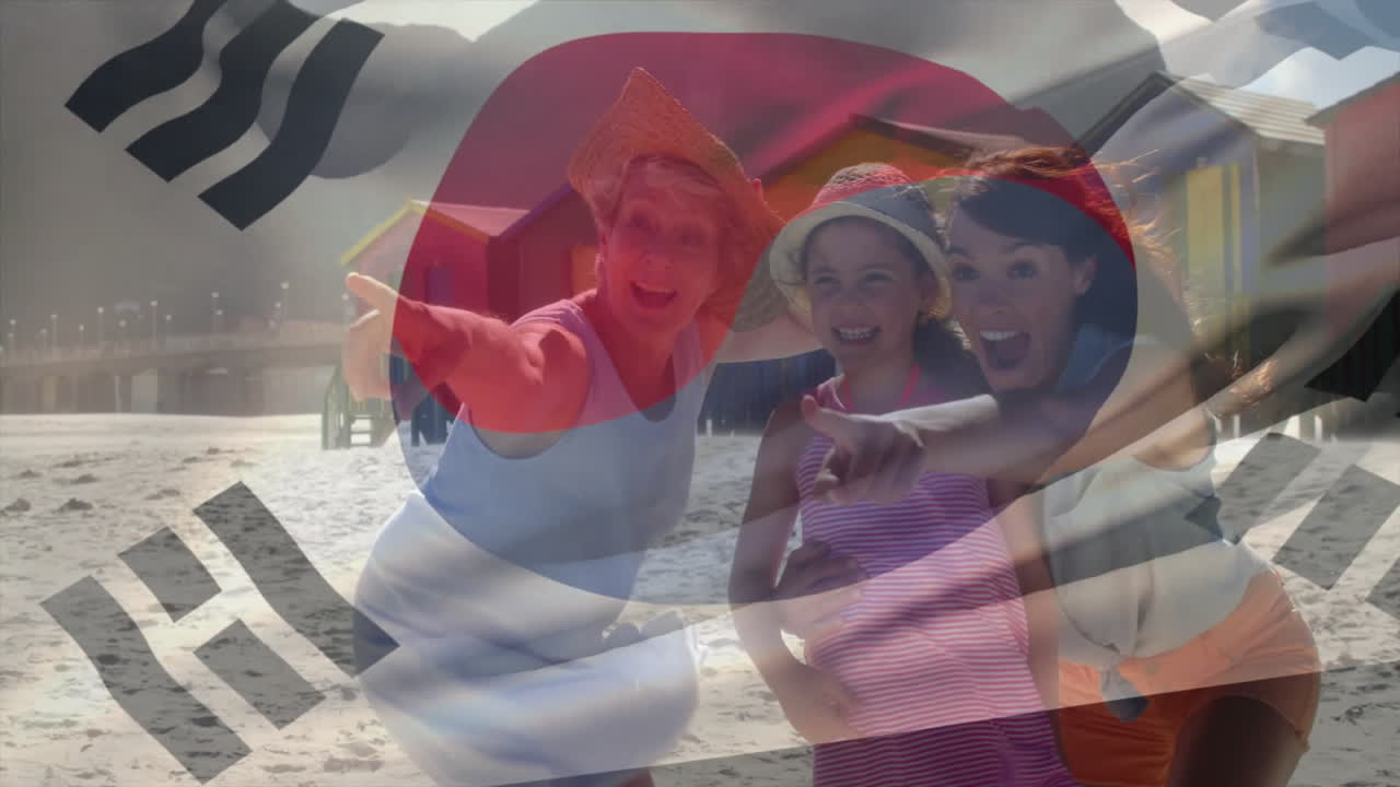 Posing on beach, three women with South Korean flag animation overlay