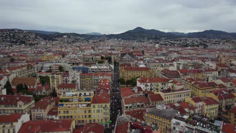 City-Buildings-of-Travel-Destination-Town-of-Nice,-France---Aerial-Drone-Flyover