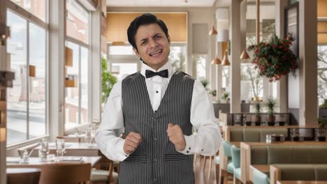 Angry-Indian-waiter-shouting-on-someone