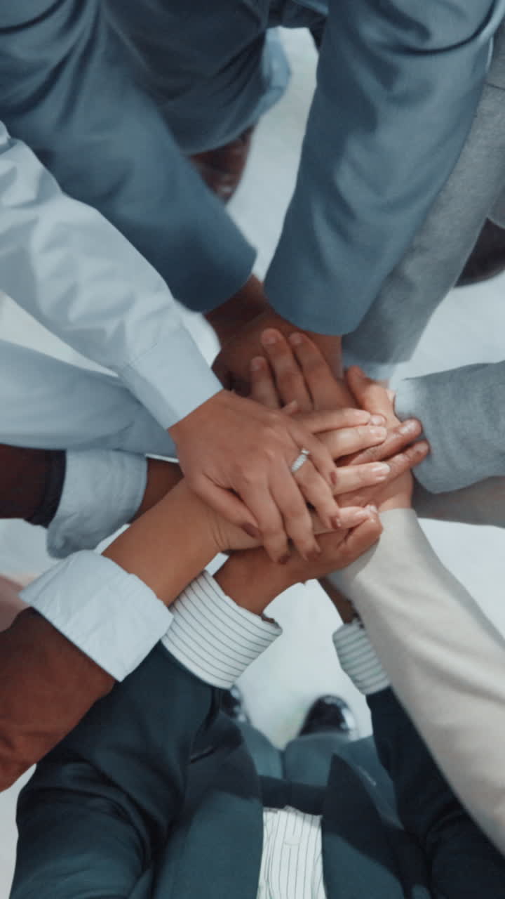 Diverse Business Team Stacking Hands in Unity and Collaboration