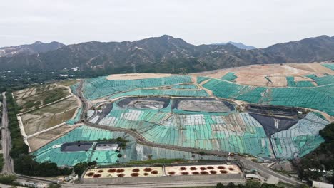 Aerial-Overview-of-North-East-New-Territories-Landfill-in-Sheung-Shui,-Hong-Kong